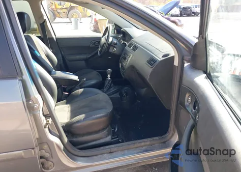 2005 Ford Focus Zx4 из США, поврежденный, VIN 1FAHP38Z45W150478